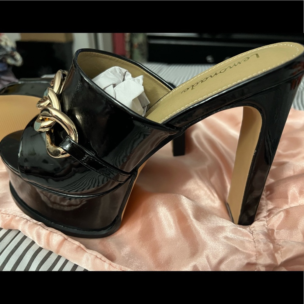 Black platform heels brand new never worn size 7 1/2 from Lola Shoetique
